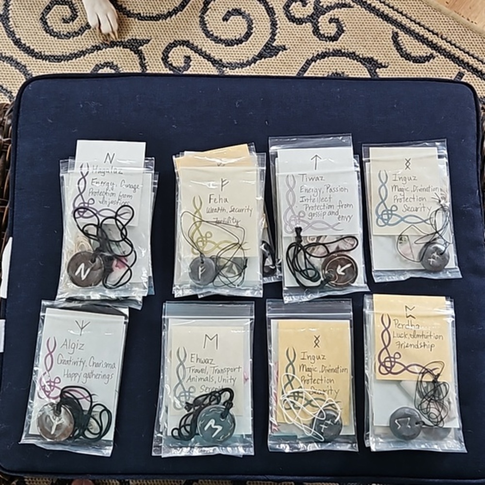 Hand made porcelain Rune pendants.